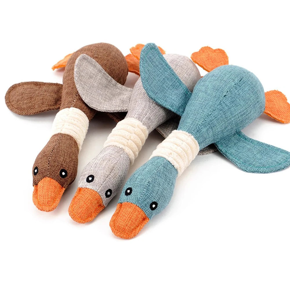 "indestructible goose dog toy," "goose chew toy for aggressive chewers," "plush goose dog toy with squeaker," "durable goose toy for dogs," "interactive goose chew toy for dogs," "squeaky goose toy for dogs," "goose toy for large dogs," "stuffed goose toy for small dogs," "goose toy for dog anxiety relief," "heavy-duty goose dog toy."