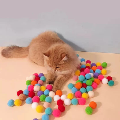 interactive cat pompom launcher, cat toy gun with pompoms, mini pompom shooter for cats, plush ball launcher for cats, interactive toys for kittens, cat playtime pompom gun, best interactive cat toys, pompom ball cat games, indoor cat exercise toys, cat fetch pompom gun, pompom launcher toy for pets, engaging cat toys, automatic pompom shooter, cat play gun with balls, creative cat toys for indoor play.