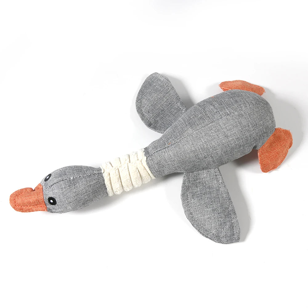 "indestructible goose dog toy," "goose chew toy for aggressive chewers," "plush goose dog toy with squeaker," "durable goose toy for dogs," "interactive goose chew toy for dogs," "squeaky goose toy for dogs," "goose toy for large dogs," "stuffed goose toy for small dogs," "goose toy for dog anxiety relief," "heavy-duty goose dog toy."